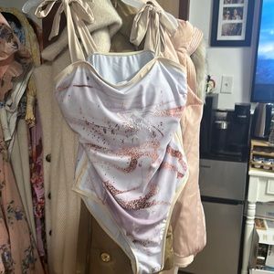 Large bathing suit, worn once purple marble design